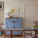 Dining area with blue cabinet