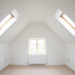 White attic with skylights