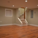 Basement with wood floor and stairs