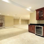 Basement with fireplace and kitchen area