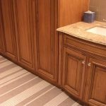 Tiled floor and brown cabinets