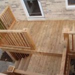 Deck with stairs on a brick house