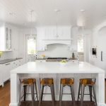 Large white kitchen with white ceiling