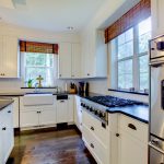 Kitchen with white cabinets and hardwood floor