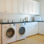 Kitchen with washer and dryer
