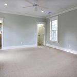 Grey room with ceiling fan