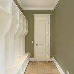 Hallway with shelving and white door