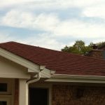 Roof with red shingles