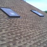 Shingled roof with two skylights